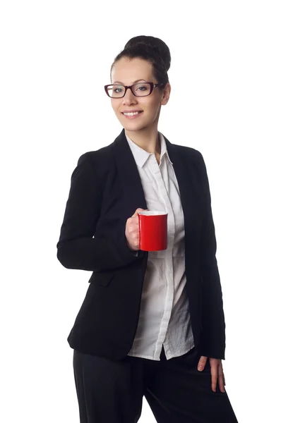 Mujer joven sosteniendo una taza de café blanco —  Fotos de Stock