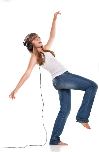 Lovely girl listening a music in headphones Royalty Free Stock Images