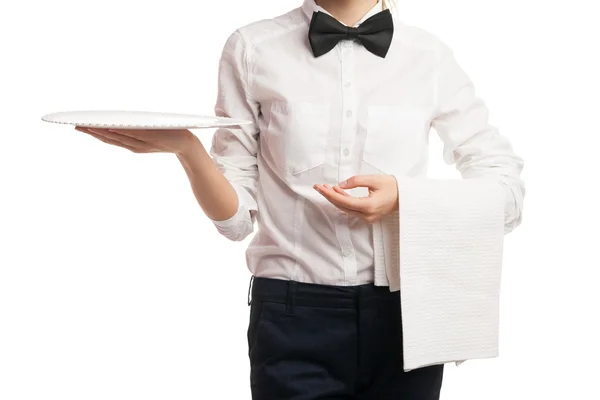 Close-up van elegante serveerster holding lade en handdoek — Stockfoto