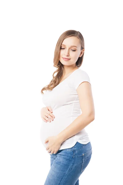 Retrato de bela mulher grávida abraçando barriga — Fotografia de Stock