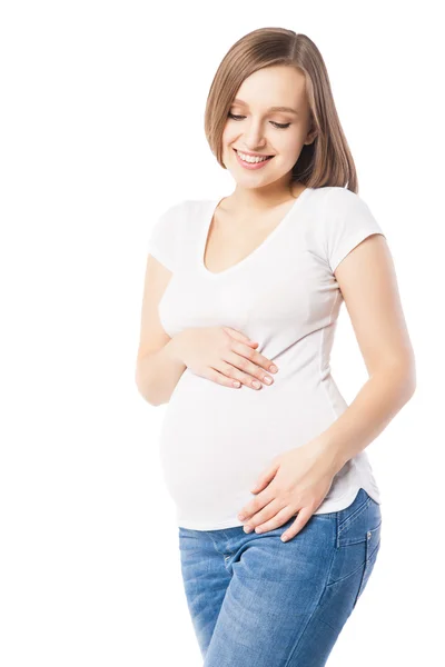 Portrét smějící se ženu, zahrnující její těhotné břicho — Stock fotografie