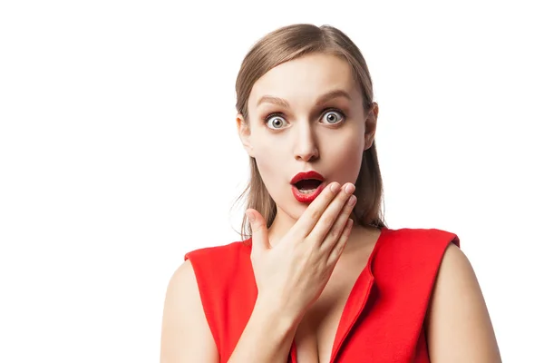 Astonished woman with open mouth looking at camera — Stock Photo, Image