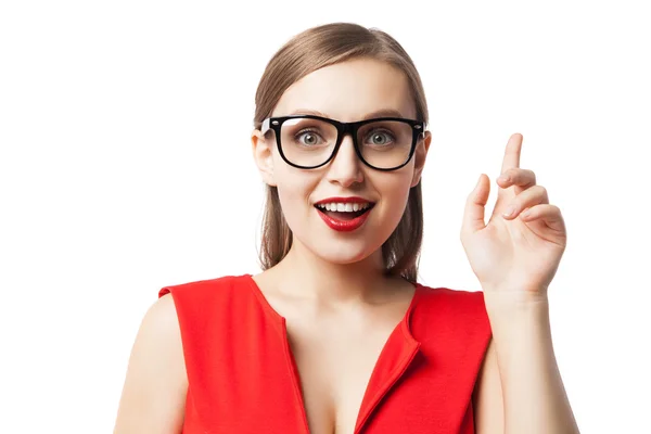 Portrait of smiling woman with index finger up — Stock Photo, Image