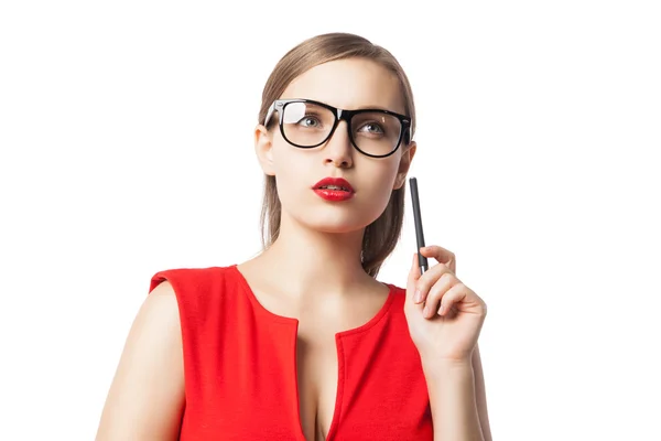 Pensive young woman with pen looking up — Stock Photo, Image