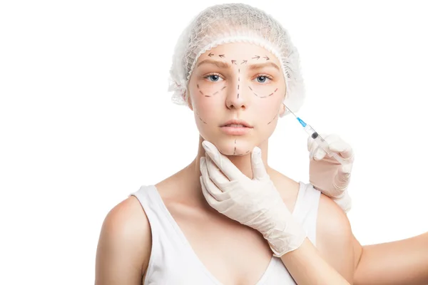 Doctor making injection into girls face — Stock Photo, Image