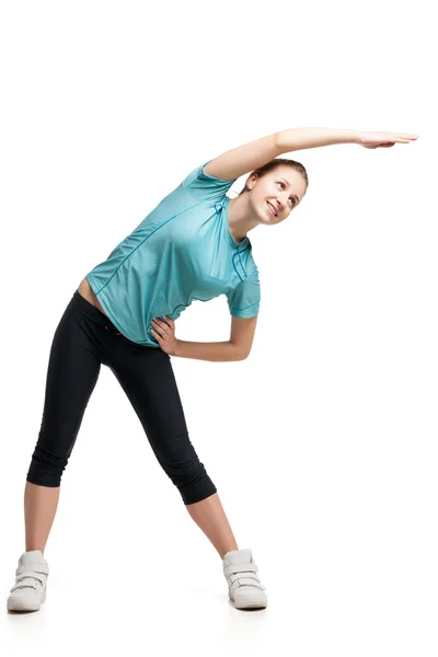 Beautiful sporty woman doing exercise — Stock Photo, Image