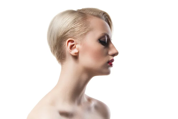 Söt blond kvinna med make-up tittar ner. Isolera — Stockfoto