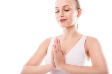 Lotus izole pozisyonda oturan genç kadın