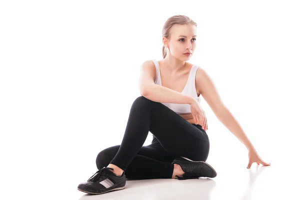 Hermosa mujer deportiva haciendo ejercicio aislado — Foto de Stock