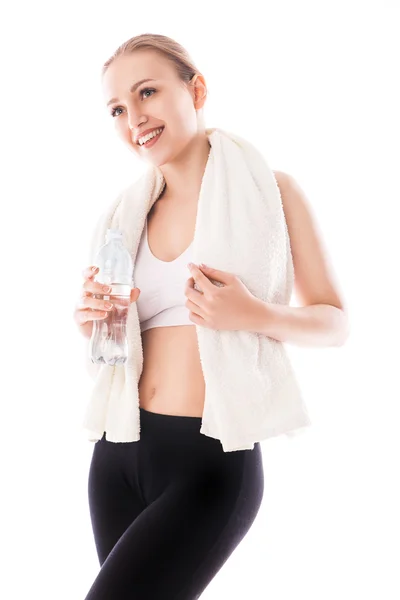 Woman with bottle of water and towel. Fitness wear — Stock Photo, Image