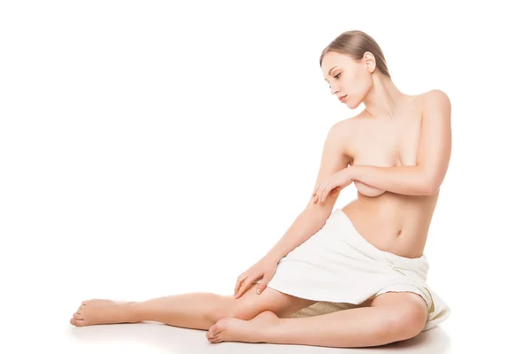 Young beautiful woman wrapped in towel after bath — Stock Photo, Image