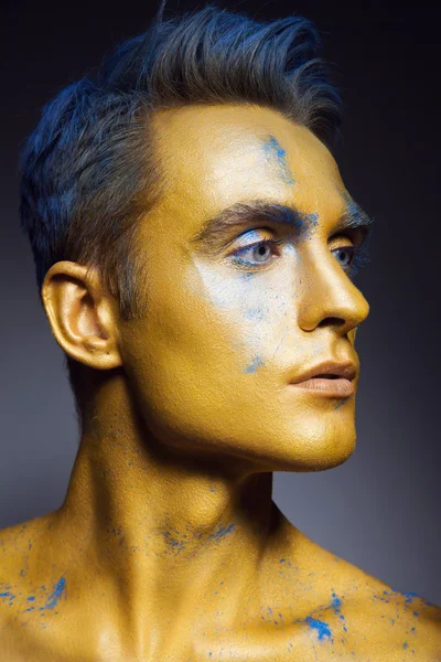 Fashion portrait of man with artistic make-up — Stock Photo, Image
