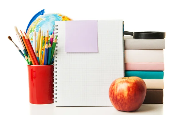 Globe, notebook stack and pencils isolated — Stock Photo, Image