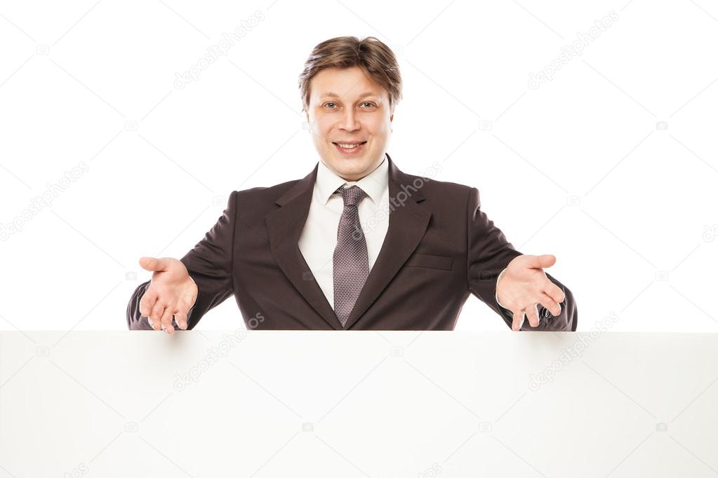 Business man holding empty board and pointing