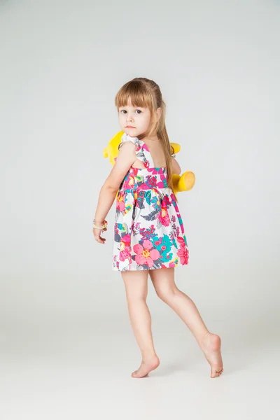 Little fashion girl in beautiful dress posing — Stock Photo, Image