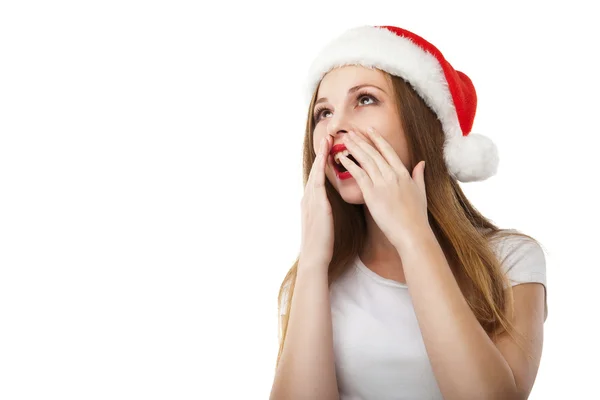 Surprised christmas woman wearing santa hat — Stock Photo, Image