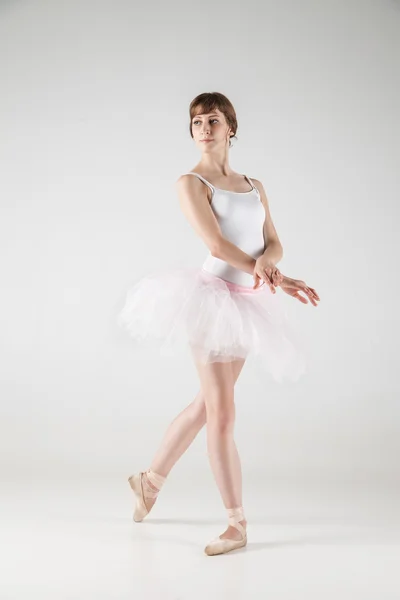 Ballet dancer in white tutu posing — Stock Photo, Image