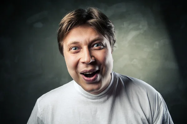 Young beautiful man surprised face expression — Stock Photo, Image