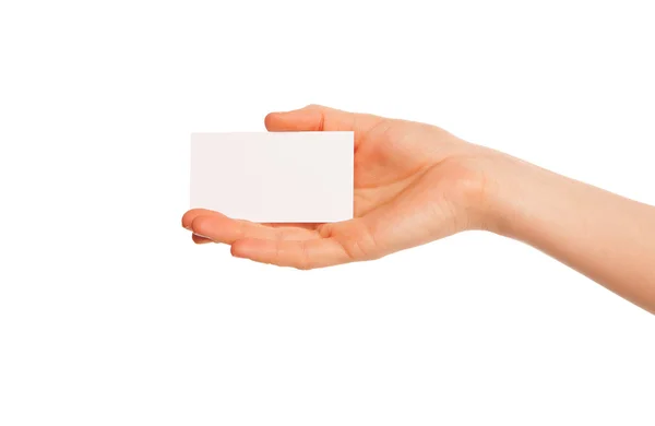 One hand holding a white piece of cardboard. — Stock Photo, Image