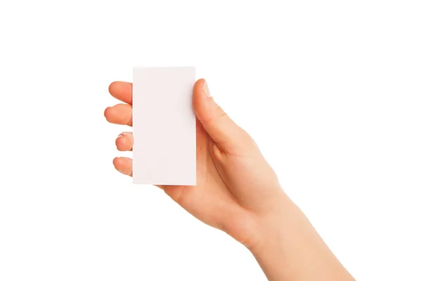 Jedna ręka trzyma biały kawałek tektury. — Zdjęcie stockowe