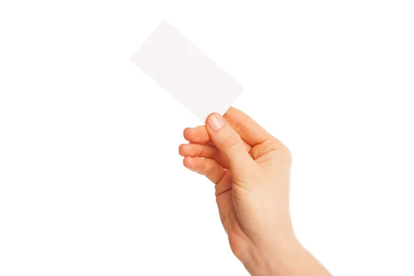 In hand blank sheet of white paper held diagonally — Stock Photo, Image