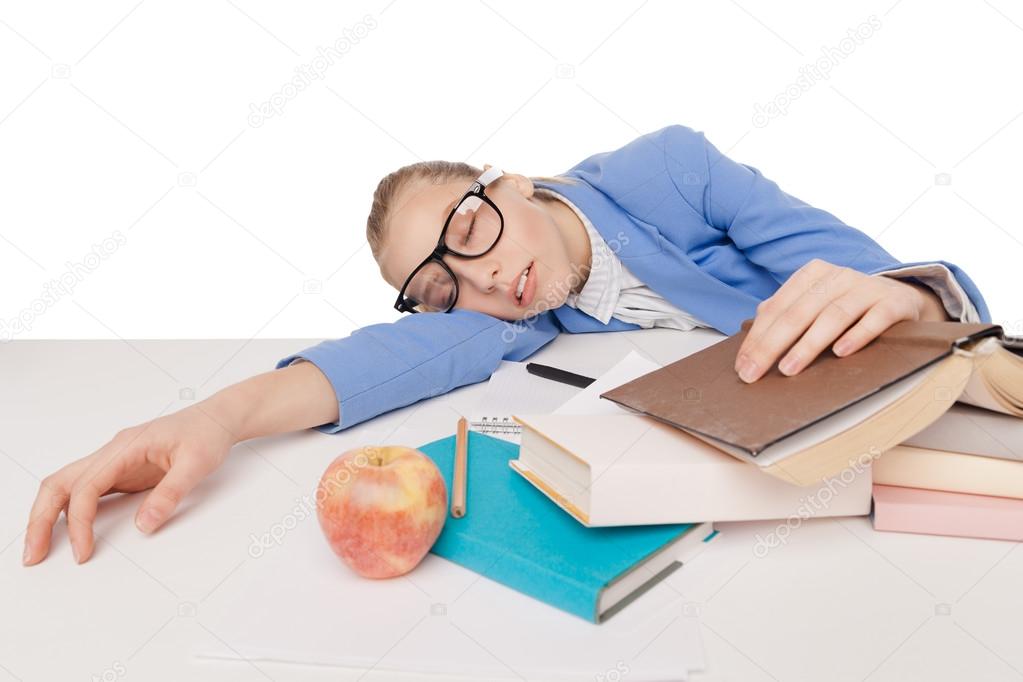 student girl in big glasses sit and sleep