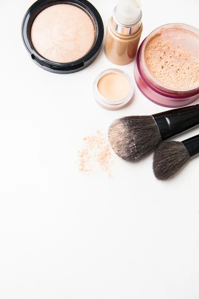 Powder, foundation and brushes on the white background — Stock Photo, Image