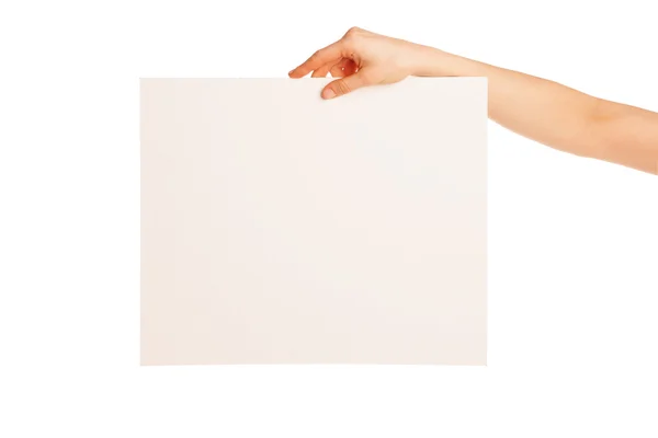 In hand big blank sheet of white paper shown down — Stock Photo, Image