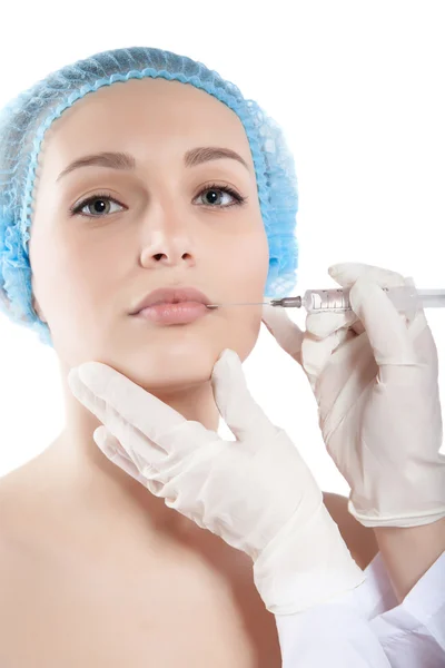 Beautiful woman gets an injection in her face close-up — Stock Photo, Image