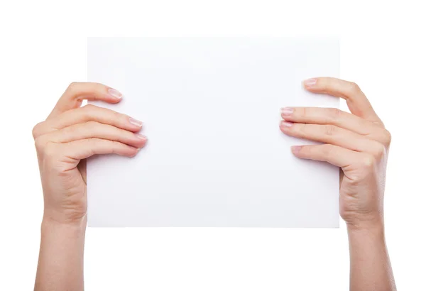 Hand met blanco papier geïsoleerd — Stockfoto