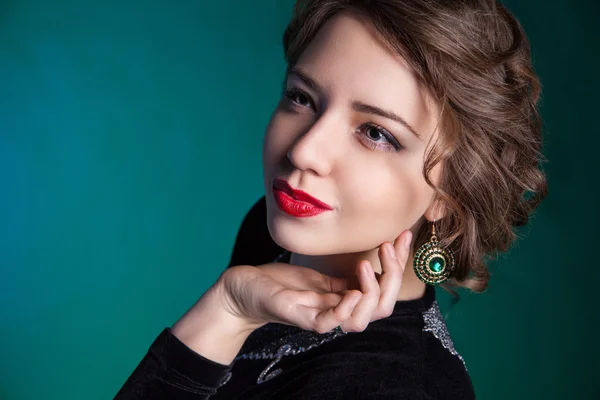 Portrait of beautiful young woman with evening make-up — Stock Photo, Image