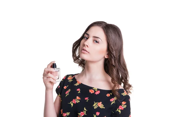 Young woman spraying the perfume — Stock Photo, Image