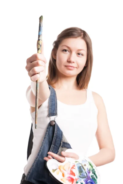 Artist woman with paint palette keeping brush — Stock Photo, Image