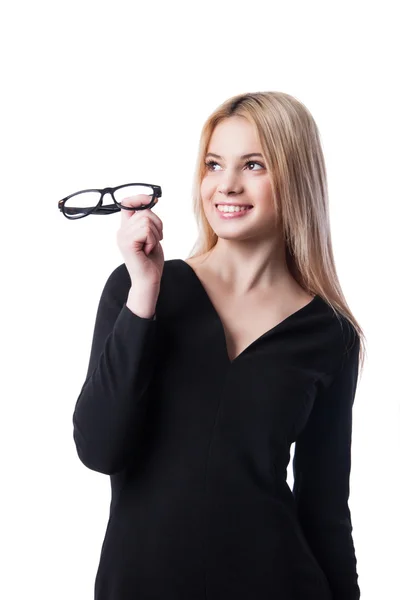 Mujer de negocios sosteniendo gafas y mirando hacia arriba — Foto de Stock