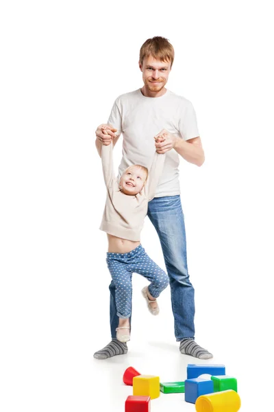 Baby girl building playing with her father — Stock Photo, Image