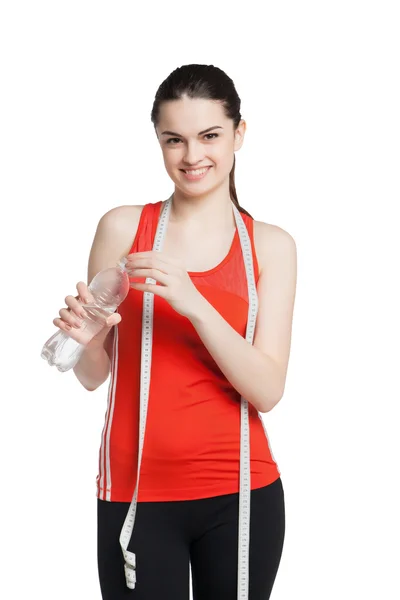 Gesunde Frau mit einer Flasche Wasser — Stockfoto