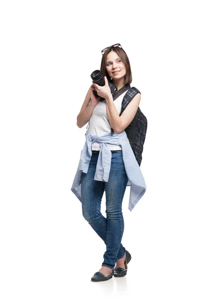 Young woman tourist with camera and backpack — Stock Photo, Image