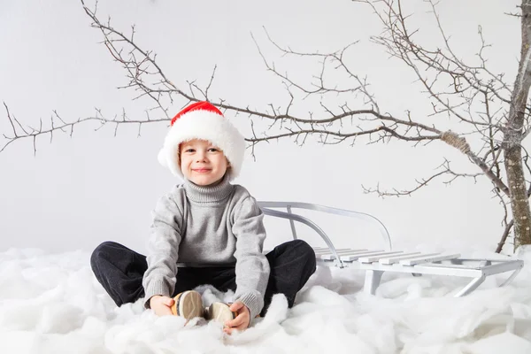 Littel niño sonriendo celebrando Año Nuevo —  Fotos de Stock