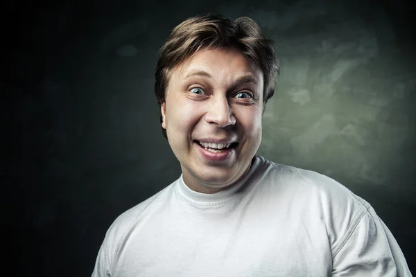 Funny holarious middle aged man over gray — Stock Photo, Image