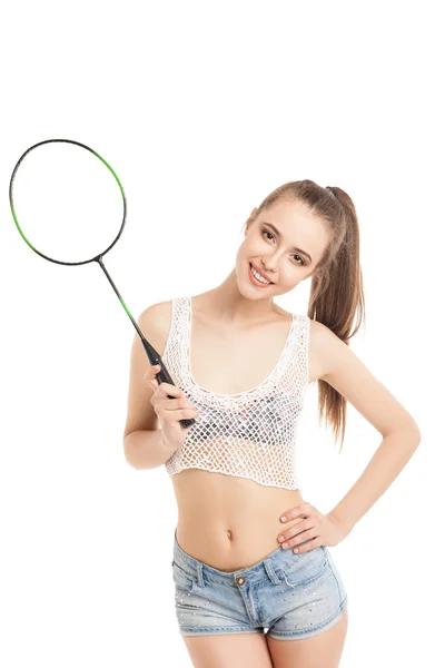 Vacker flicka håller badmintonracketen — Stockfoto
