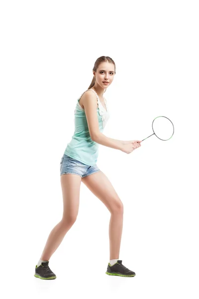 Mooi meisje spelen met badminton racket — Stockfoto