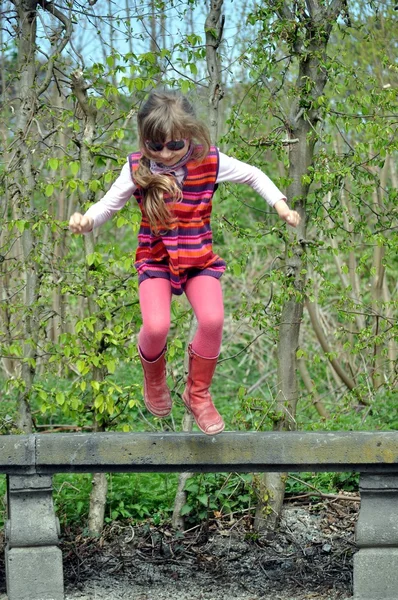 The girl is jumping . — Stock Photo, Image