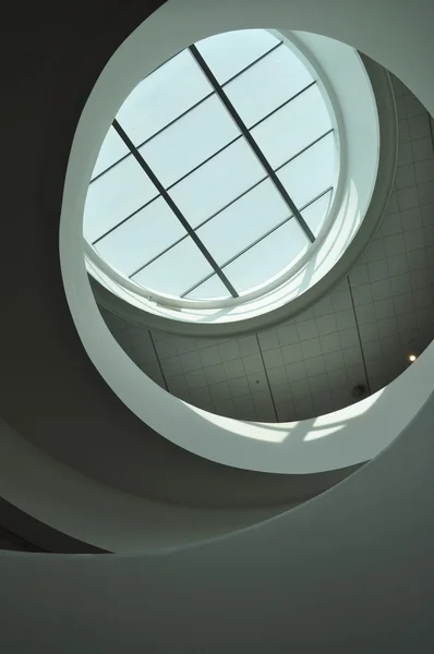 Abstract roof . Spiral roof with a window . — Stock Photo, Image