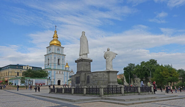 Kiev. Ukraine. may 11, 2019 Monument to princess olga and the Mikhailovsky golden-domed cathedral on Mikhailovskaya square on a spring evening