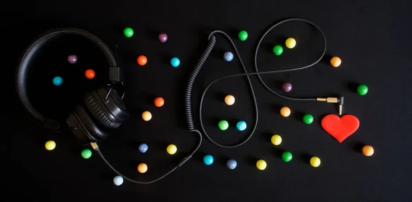 Wired Headphones Multicolored Balls Red Heart Black Background Audiophilia Variety — Stock Photo, Image