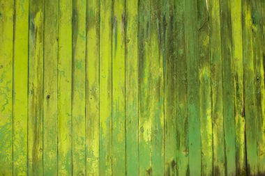 Eski yeşil ahşap tahtalardan yapılmış arkaplan resmi