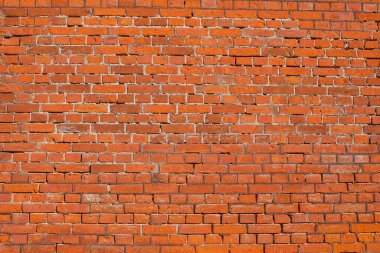 Kırmızı kahverengi tuğla duvar Güzel düzenlenmiş doku arkaplanı.