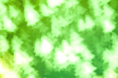 Köknar ağacı şeklinde bulanık yeşil arkaplan. Yumuşak odaklı doku.