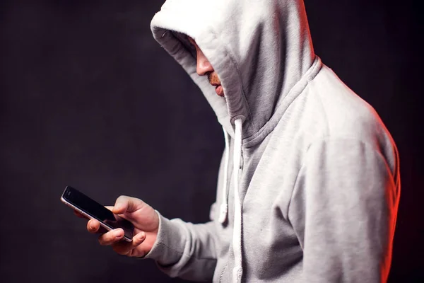 Man Wearing Hoody Sweater Mobile Phone Hands Crime Hacking Concept — Stock Photo, Image