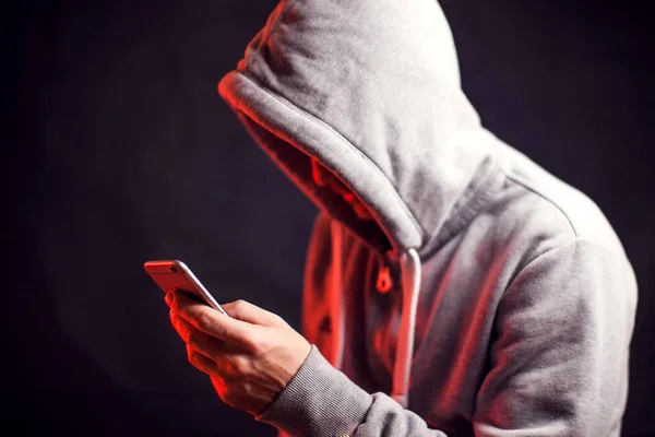 Man Wearing Hoody Sweater Mobile Phone Hands Crime Hacking Concept — Stock Photo, Image